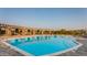 Resort-style pool with pergola, lounge chairs, and landscaped surroundings at 4615 E Navigator Ln, Phoenix, AZ 85050