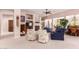 Comfortable living room features plush seating and a cozy fireplace at 5372 S Cat Claw Dr, Gold Canyon, AZ 85118