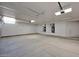Spacious and clean garage features ample storage and lighting at 553 W Cavalry Rd, New River, AZ 85087
