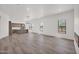 Bright and open living space featuring desert views, a modern kitchen, and plenty of natural light at 553 W Cavalry Rd, New River, AZ 85087