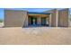 Covered patio with tiled floor, offering a relaxing outdoor space with seating at 553 W Cavalry Rd, New River, AZ 85087