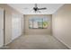 Light and bright bedroom with a closet, window with blinds, and neutral colored carpet at 5734 W Commonwealth Pl, Chandler, AZ 85226