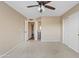Neutral bedroom showcasing plush carpeting, closet, and an open doorway to a hallway at 5734 W Commonwealth Pl, Chandler, AZ 85226
