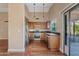 Modern kitchen with stainless steel appliances, wooden cabinetry and granite countertops at 5734 W Commonwealth Pl, Chandler, AZ 85226