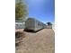 Spacious backyard with gravel landscaping and white picket fence, offering privacy and low maintenance at 625 W Mckellips Rd # 325, Mesa, AZ 85201