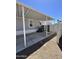 Covered parking area provides shelter, adjacent to side entrance to house at 625 W Mckellips Rd # 325, Mesa, AZ 85201