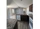 Stylish kitchen featuring a large island, granite countertops, and ample cabinet space at 625 W Mckellips Rd # 325, Mesa, AZ 85201