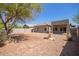 Attractive backyard featuring a fountain, providing a charming outdoor living space at 664 W Silver Reef Ct, Casa Grande, AZ 85122