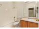 Clean bathroom featuring a shower-tub combo and a vanity with ample counter space at 664 W Silver Reef Ct, Casa Grande, AZ 85122
