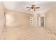 Large bedroom with carpet and fan lighting for a comfortable space at 664 W Silver Reef Ct, Casa Grande, AZ 85122