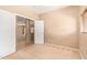 Neutral-toned bedroom featuring a sliding closet door and carpet flooring at 664 W Silver Reef Ct, Casa Grande, AZ 85122