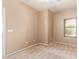 Bright bedroom with a corner window adding architectural interest and natural light at 664 W Silver Reef Ct, Casa Grande, AZ 85122