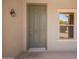 Exterior shot of the front door and sidelight window at 664 W Silver Reef Ct, Casa Grande, AZ 85122