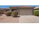 Charming single-story home featuring a well-maintained yard and two-car garage at 664 W Silver Reef Ct, Casa Grande, AZ 85122