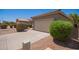 Home with a two-car garage and low-maintenance landscaping at 664 W Silver Reef Ct, Casa Grande, AZ 85122