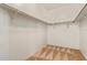 A walk-in closet with carpet and white walls and shelving at 664 W Silver Reef Ct, Casa Grande, AZ 85122