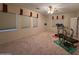 Empty carpeted bedroom is ready for the new owner's decor and furnishings at 6904 E Trailridge Cir, Mesa, AZ 85207