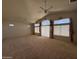 Empty bedroom with three large windows providing ample natural light at 6904 E Trailridge Cir, Mesa, AZ 85207