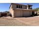 This property features a three-car garage plus additional parking at 6904 E Trailridge Cir, Mesa, AZ 85207