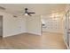 Open living room featuring stylish new flooring, neutral paint, and lots of built-in storage at 7008 W Sierra St, Peoria, AZ 85345