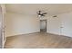 Spacious living room featuring stylish new flooring and a neutral color palette at 7008 W Sierra St, Peoria, AZ 85345