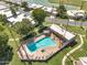 Aerial view of a community pool with lounge chairs, landscaping, and inviting recreational amenities at 7832 E Via Marina --, Scottsdale, AZ 85258
