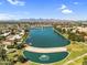 Spectacular aerial view of a tranquil lake and residential area, showcasing the beautiful landscape at 7832 E Via Marina --, Scottsdale, AZ 85258