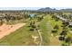 Stunning aerial view of a golf course community with lush greenery and mountain views at 7832 E Via Marina --, Scottsdale, AZ 85258