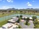 Breathtaking aerial view of property overlooking the lake, golf course, and mountains in the distance at 7832 E Via Marina --, Scottsdale, AZ 85258