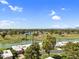 Picturesque aerial view of homes backing onto a scenic golf course and lake, creating a serene environment at 7832 E Via Marina --, Scottsdale, AZ 85258