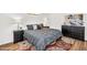 Comfortable bedroom with a gray bed, bedside tables, and warm lighting, perfect for a restful night's sleep at 7832 E Via Marina --, Scottsdale, AZ 85258