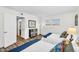 Inviting bedroom with two twin beds, closet and wood-look flooring at 7832 E Via Marina --, Scottsdale, AZ 85258