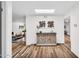 Bright entryway with stylish decor, wood floors, and views to the living and dining areas at 7832 E Via Marina --, Scottsdale, AZ 85258