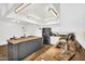 Bright kitchen featuring white cabinetry, gray island, and stainless steel appliances at 7832 E Via Marina --, Scottsdale, AZ 85258