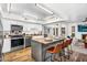Modern kitchen featuring stainless steel appliances, a center island with seating, and ample counter space at 7832 E Via Marina --, Scottsdale, AZ 85258