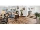 Bright, open living room with fireplace, stylish decor, hardwood floors, and plenty of natural light at 7832 E Via Marina --, Scottsdale, AZ 85258