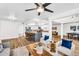 Bright living room featuring fireplace, eat-in bar, kitchen and open concept seating at 7832 E Via Marina --, Scottsdale, AZ 85258