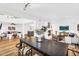Bright, open-concept living room with wood floors, fireplace, and comfortable seating areas for relaxing and entertaining at 7832 E Via Marina --, Scottsdale, AZ 85258