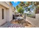 Comfortable rear patio featuring a grill, seating area and direct home access at 7832 E Via Marina --, Scottsdale, AZ 85258