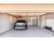 Well-organized garage offering built-in storage and painted floors, providing practical space at 8501 E Malcomb Dr, Scottsdale, AZ 85250