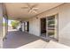 Covered patio with ceiling fans for outdoor comfort and easy access to the home's interior at 8501 E Malcomb Dr, Scottsdale, AZ 85250