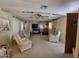 Spacious living room featuring neutral carpeting and natural light at 901 S Esperanza Ave, Mesa, AZ 85208