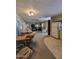 Open-concept living space with kitchen, living room, and dining area at 901 S Esperanza Ave, Mesa, AZ 85208