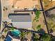 Aerial view showcasing a private pool, modern roof, and lush backyard oasis, perfect for relaxation at 9422 W Monroe St, Peoria, AZ 85345