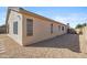 Charming home exterior featuring a well-maintained stucco facade and desert landscaping, enhancing curb appeal at 9422 W Monroe St, Peoria, AZ 85345