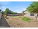 Enjoy this backyard with plenty of potential, highlighted by a desert landscape at 9422 W Monroe St, Peoria, AZ 85345
