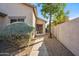 View of the front entrance, xeriscaping, and walkway that leads to the front door at 9422 W Monroe St, Peoria, AZ 85345