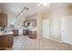Large kitchen with tile flooring, laminate counters, and plenty of cabinet space at 9422 W Monroe St, Peoria, AZ 85345