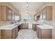 Spacious kitchen with tile flooring, ample counter space, and classic-style cabinetry at 9422 W Monroe St, Peoria, AZ 85345