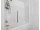 The shower/bath in this bathroom features a showerhead, faucet, and a safety bar at 1156 N San Benito Dr, Gilbert, AZ 85234